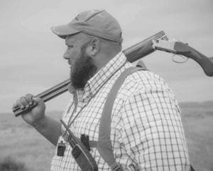 Brandon Moss a Sage Grouse Hunter in Montana in the field.