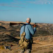 Ryan Busse bird hunting with his dogs in Montana