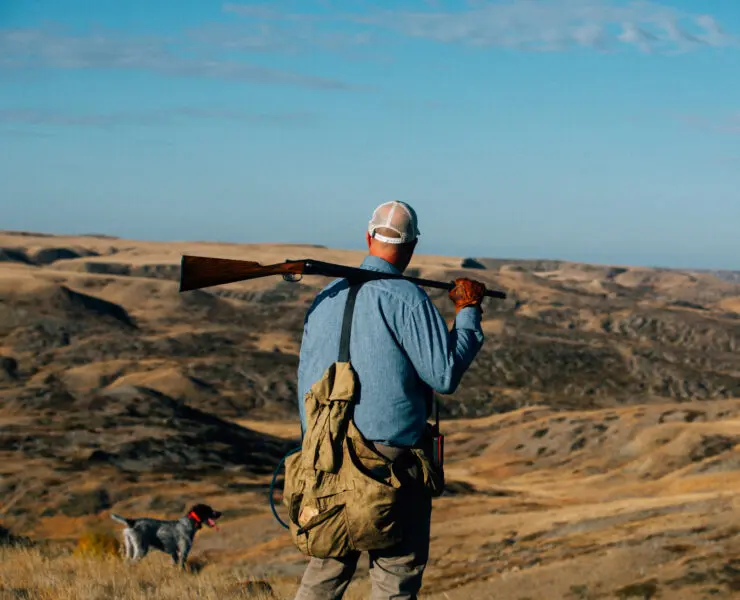 Ryan Busse bird hunting with his dogs in Montana