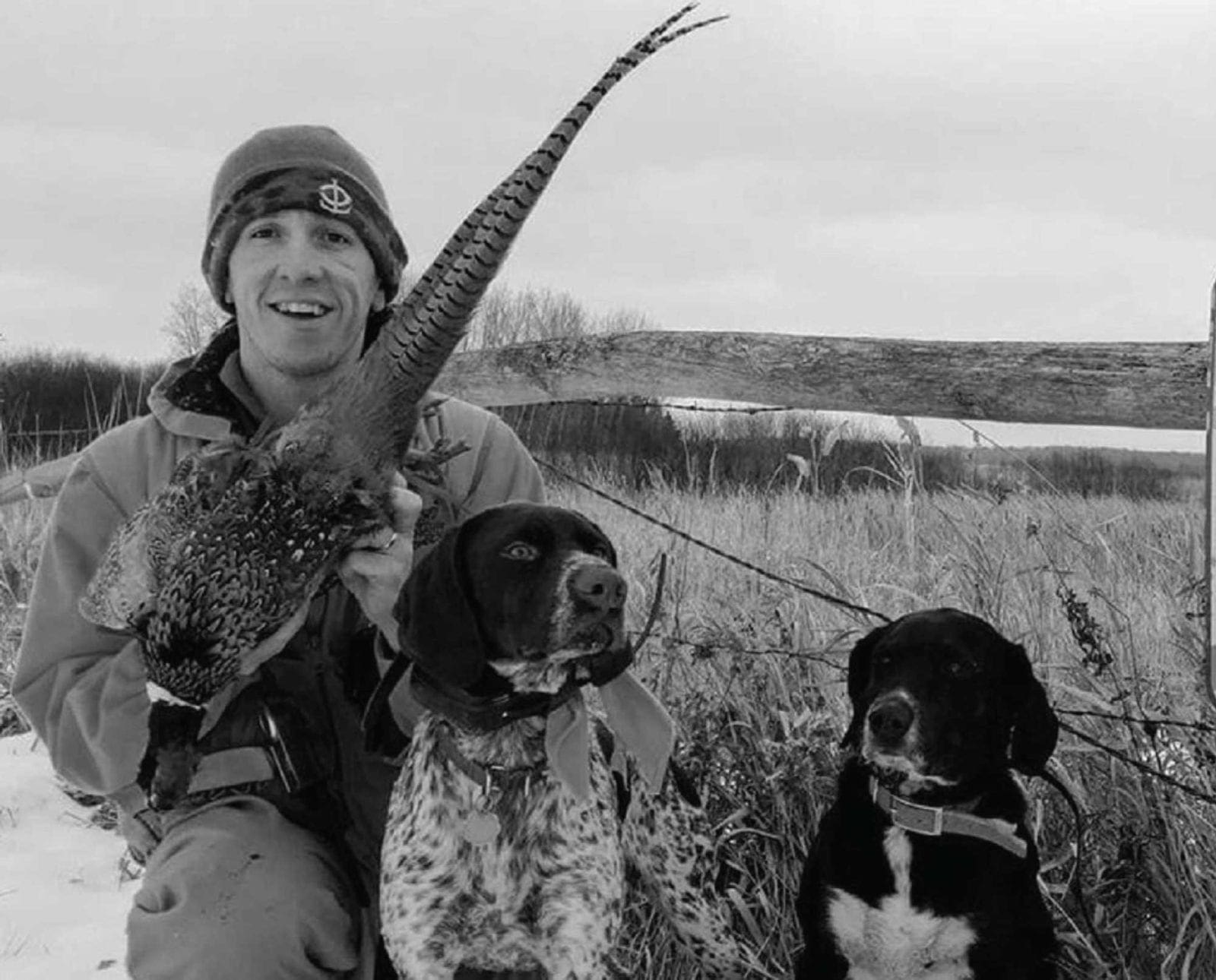 Sabin Adams on a pheasant hunt with his dogs Remnar and Daisy