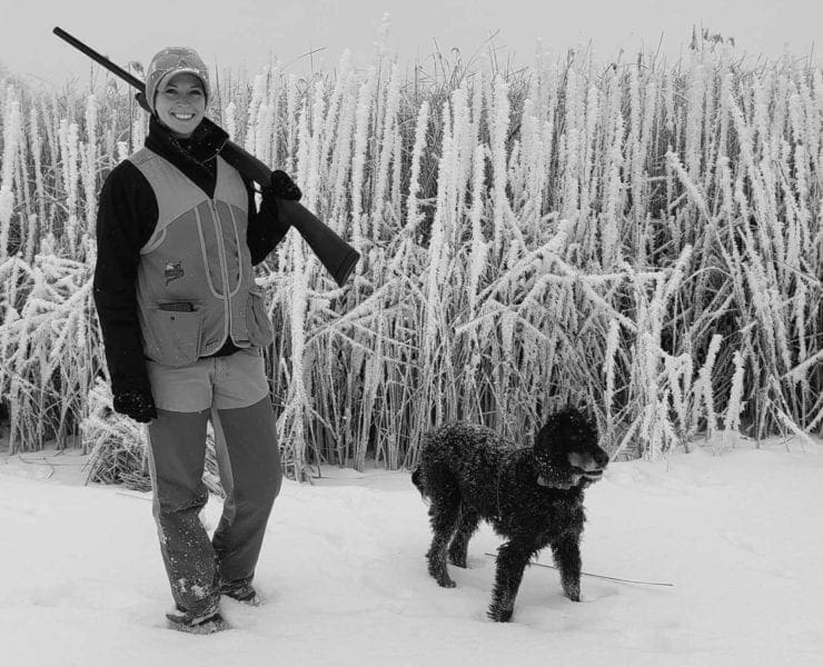Ashley Peter pheasant hunting with a Gordon Setter