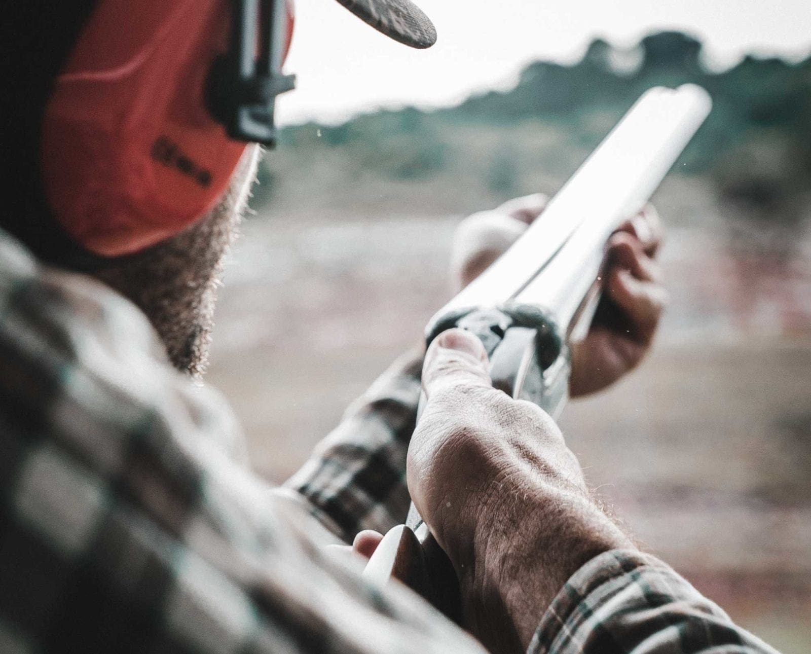 A wingshooter practices the Churchill method on a sporting clays range.