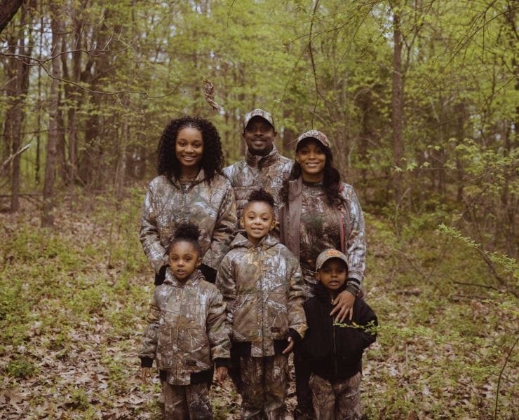 The Woodward family of HALO Outdoors in the woods turkey hunting