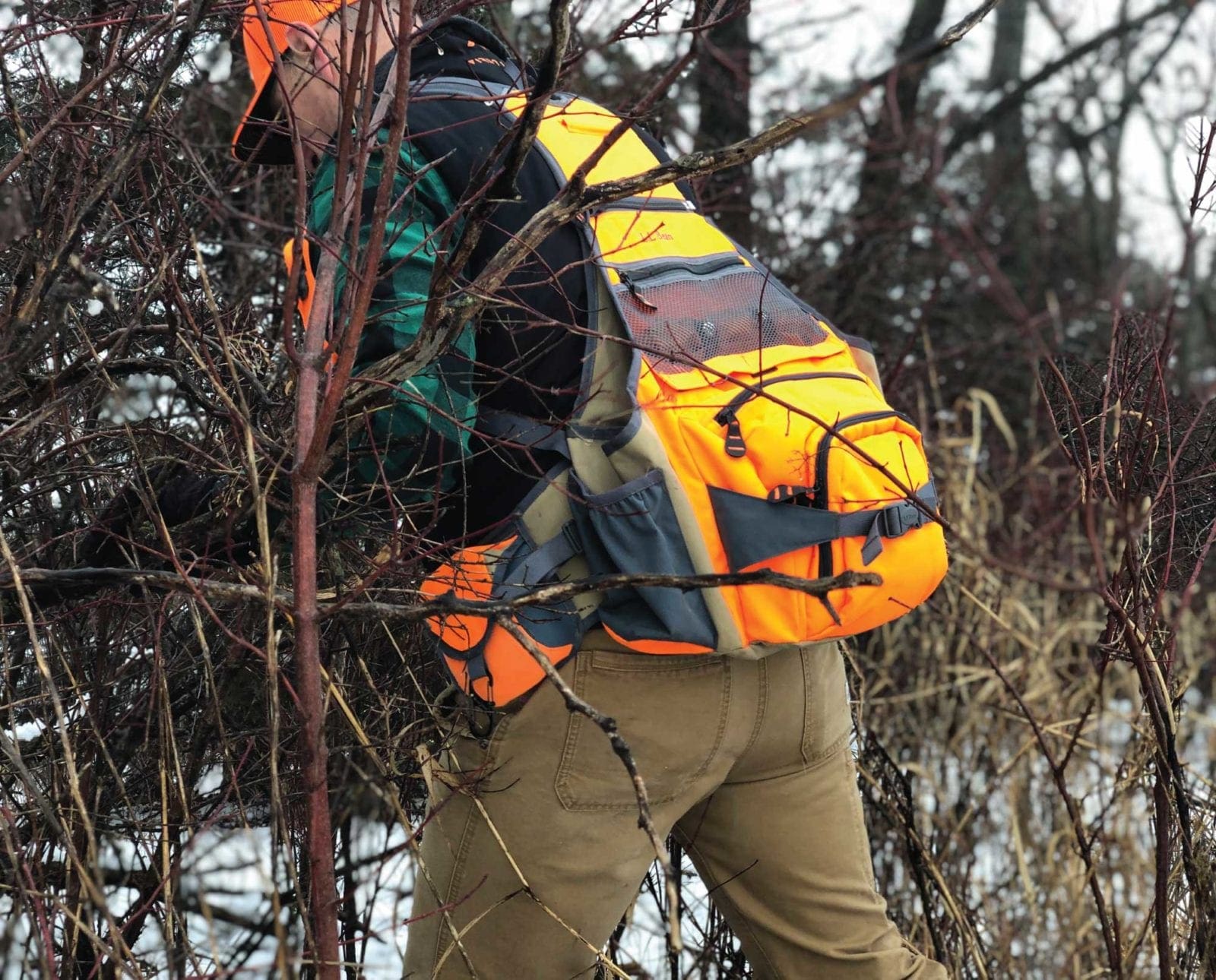a bird hunter wearing an L.L. Bean Technical Upland Vest Pack.