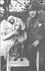 Major Robert Herber and his wife with a Weimaraner
