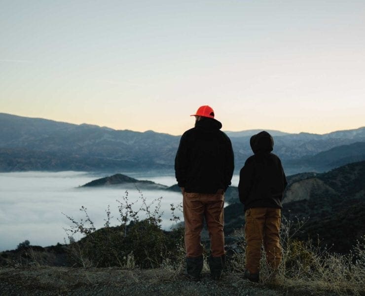 A father and son overlook public lands in California