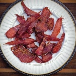 A plate of dehydrated pheasant jerky for a wild game recipe