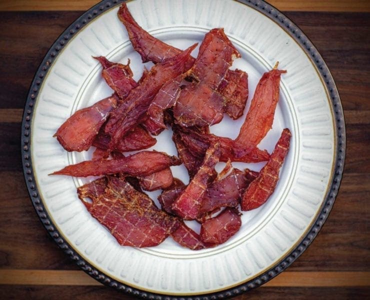 A plate of dehydrated pheasant jerky for a wild game recipe
