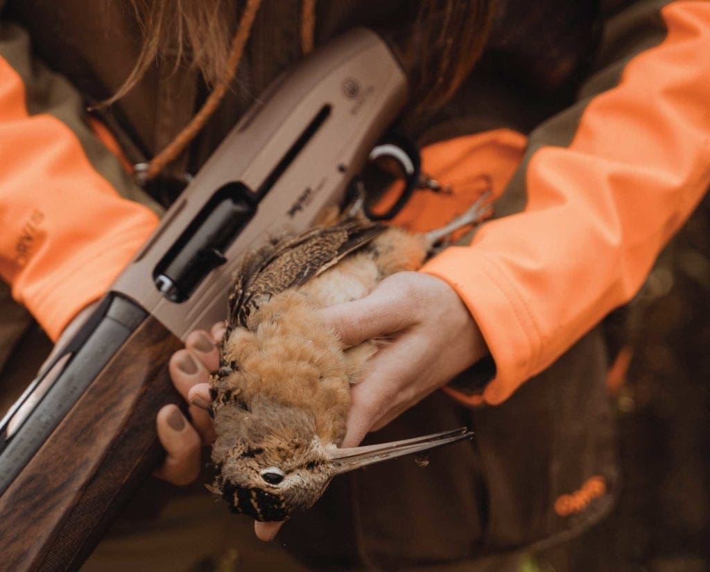 Amanda holds an American woodcock