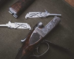 A Westley Richards & Co boxlock shotgun on a table.