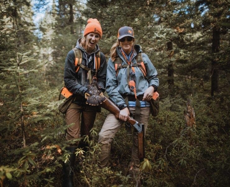 two women hunting spruce grouse in Minnesota during the making of a Project Upland documentary