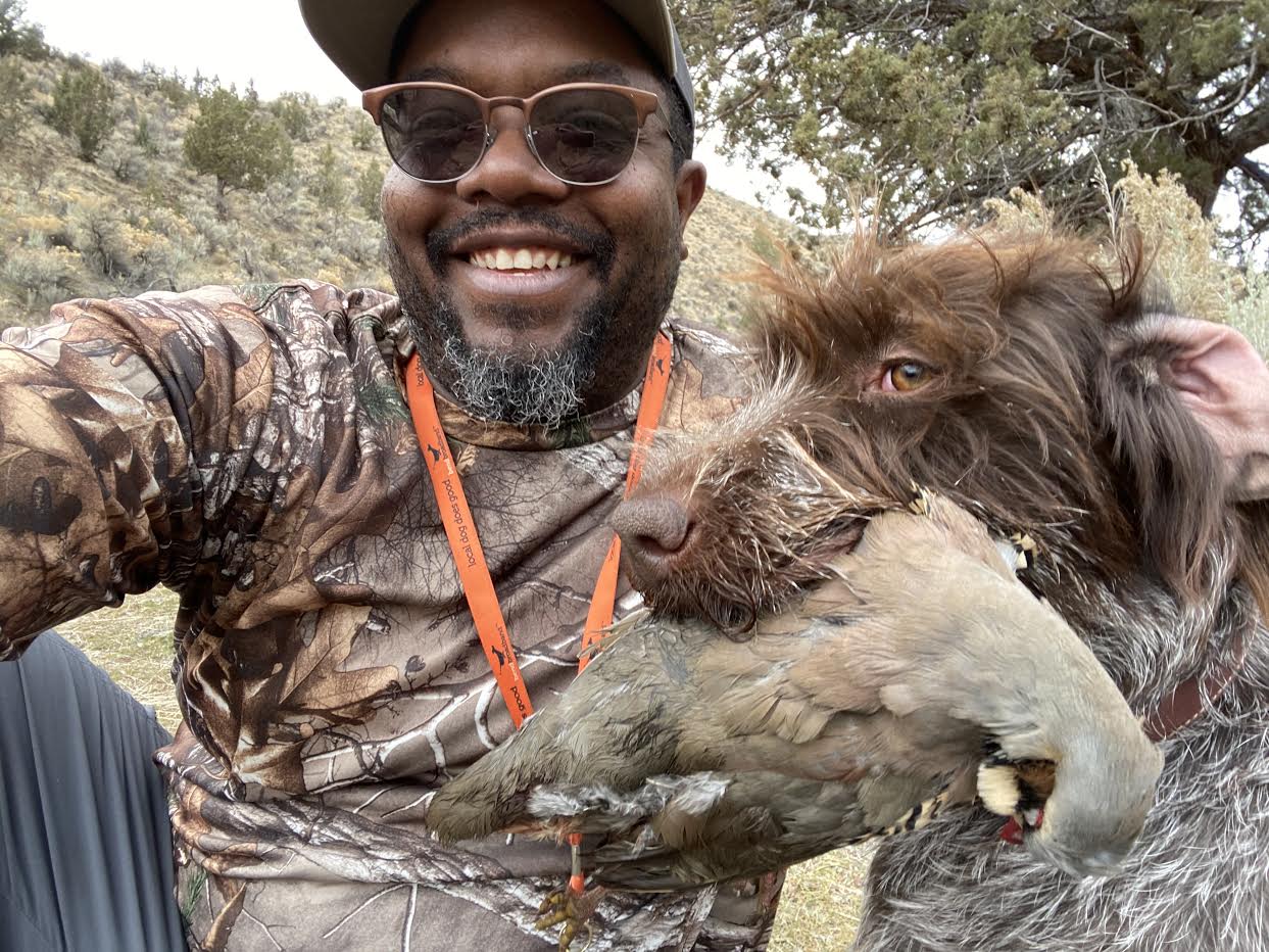 Eric Thompson, co-creator of Hardwired Outdoors hunting chukar with his dog.
