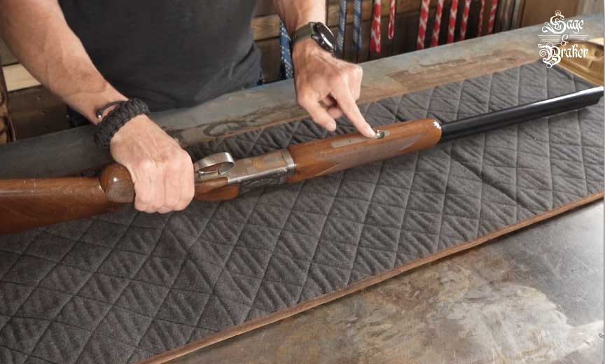removing the forend of an over and under shotgun