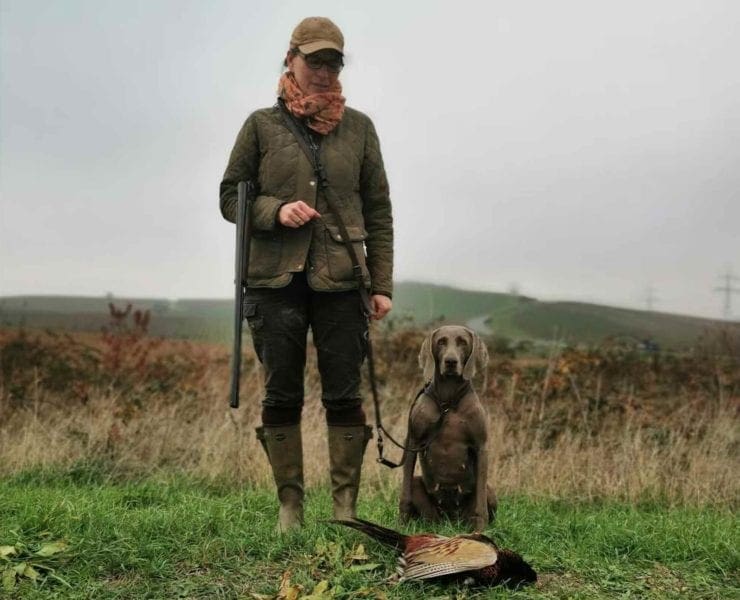 Nadja Niesner with her Weimaraner and a pheasant