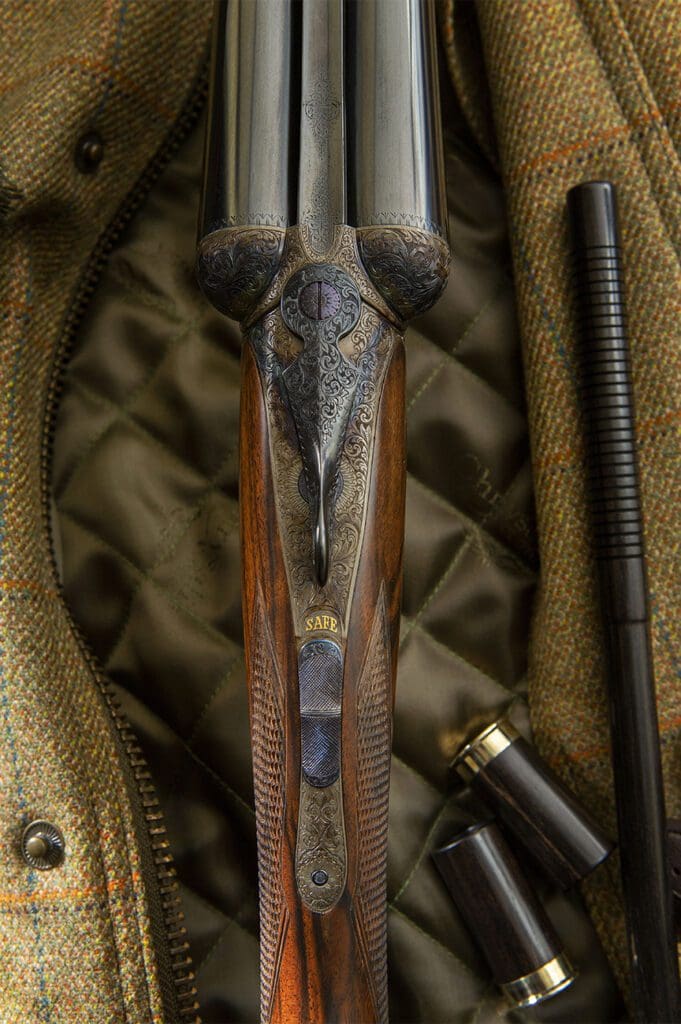 A Dickson & Son round action side-by-side shotgun