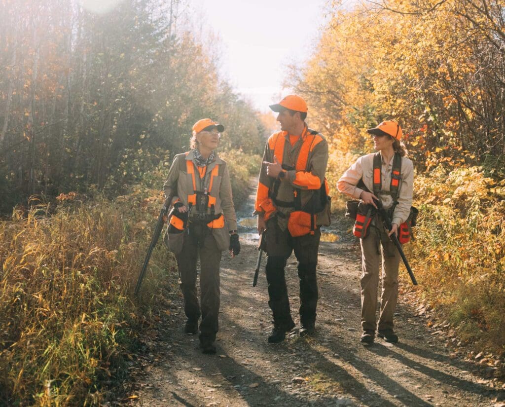 A group of upland hunters at various ages
