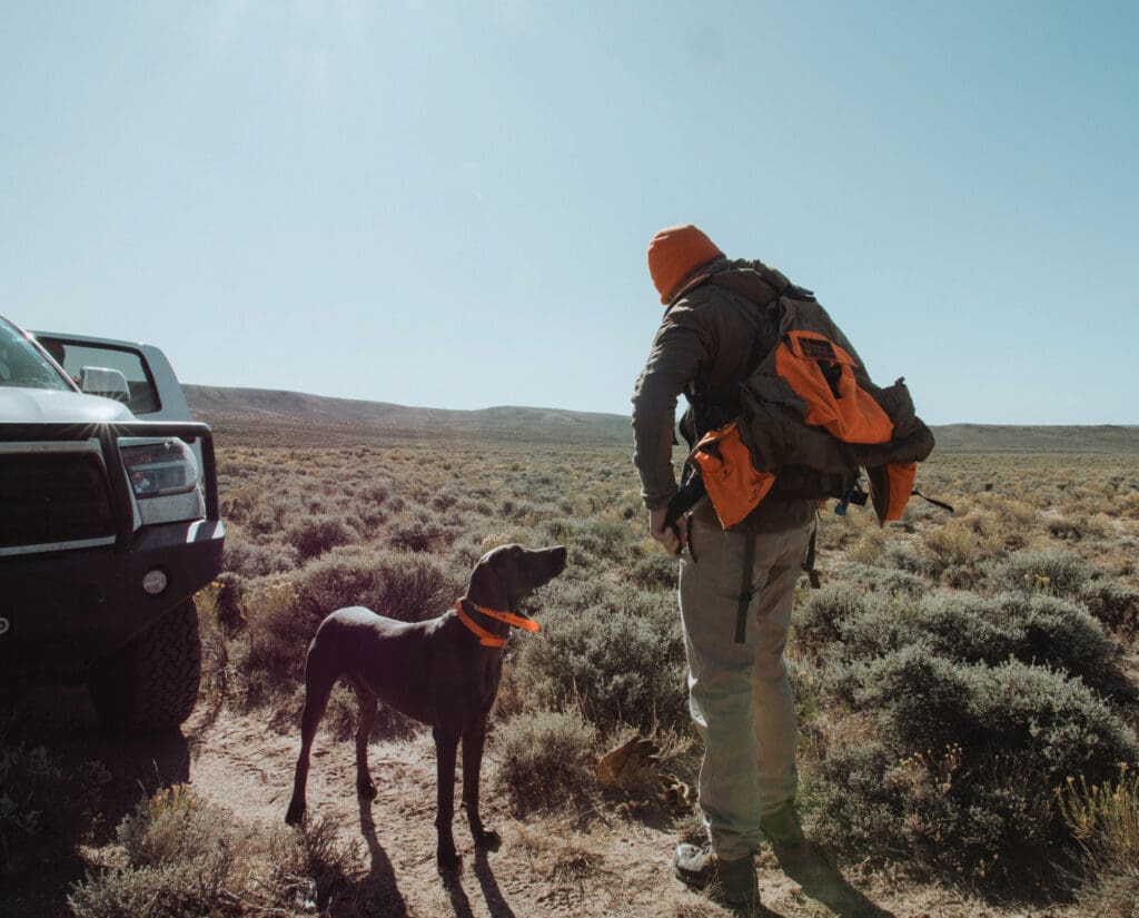 A hunter gets ready to train his bird dog in Wyoming