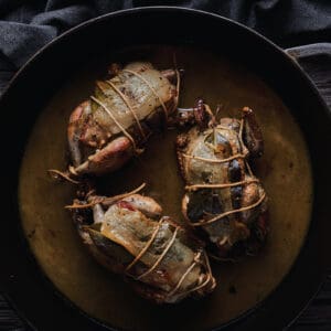 Hungarian Partridge roasted in a pan and ready to serve