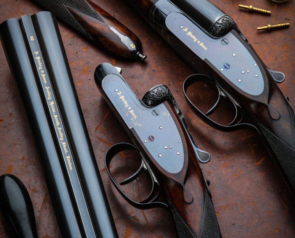 A pair of Purdey 12g “unengraved” hammerless self openers