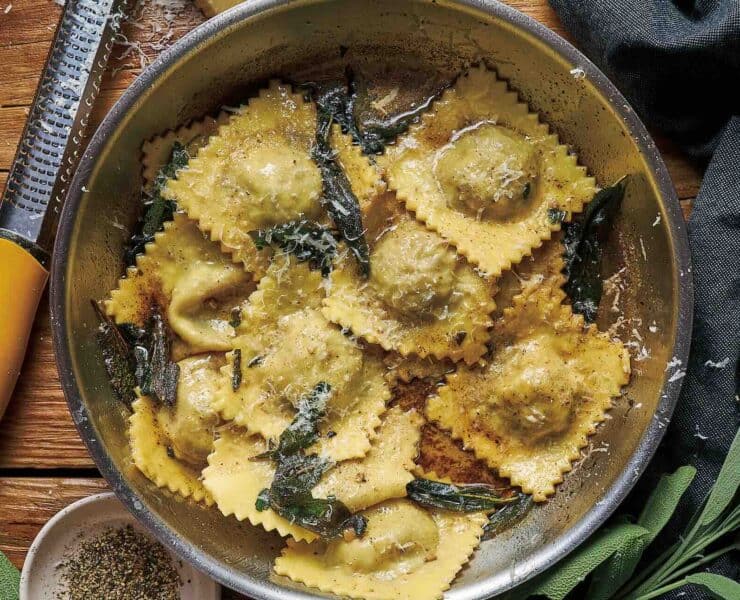 A pot of ravioli filled with braised woodcock, tossed with a butter-sage sauce