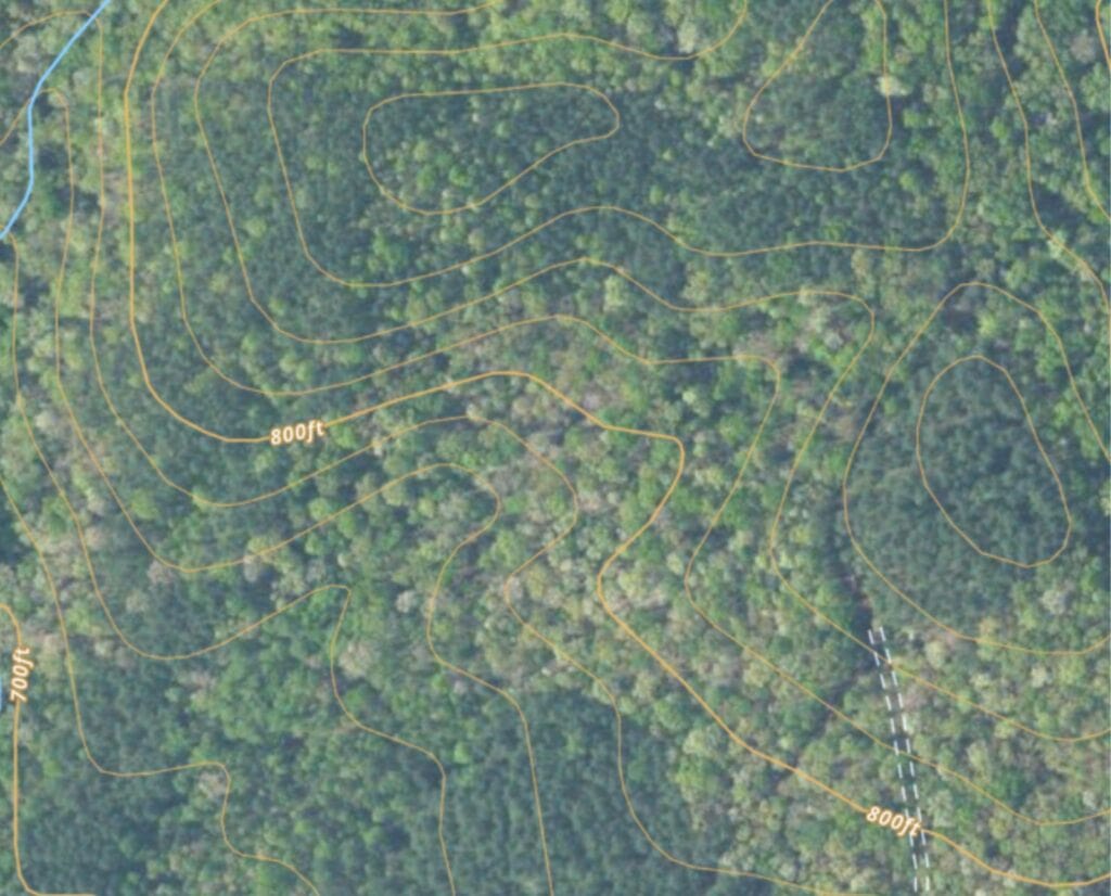 A topographical map depicting a saddle and a creek.