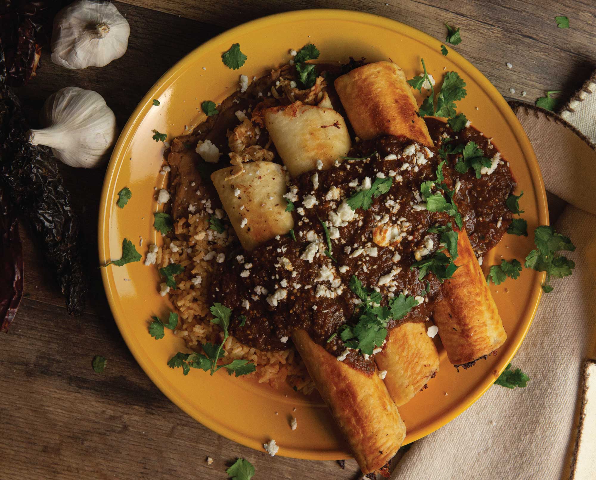 Flautas de Faisán also known as Pheasant flautas plated for serving