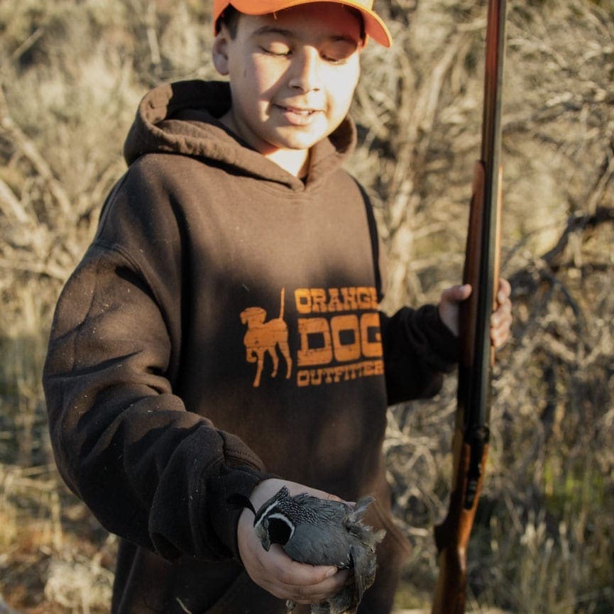 Ruben Mata's son with his first bird. 