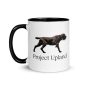 A white mug with a Pudelpointer on it.