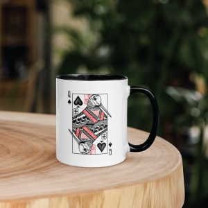 Woodcock Queen Playing Card mug on a coffee table.