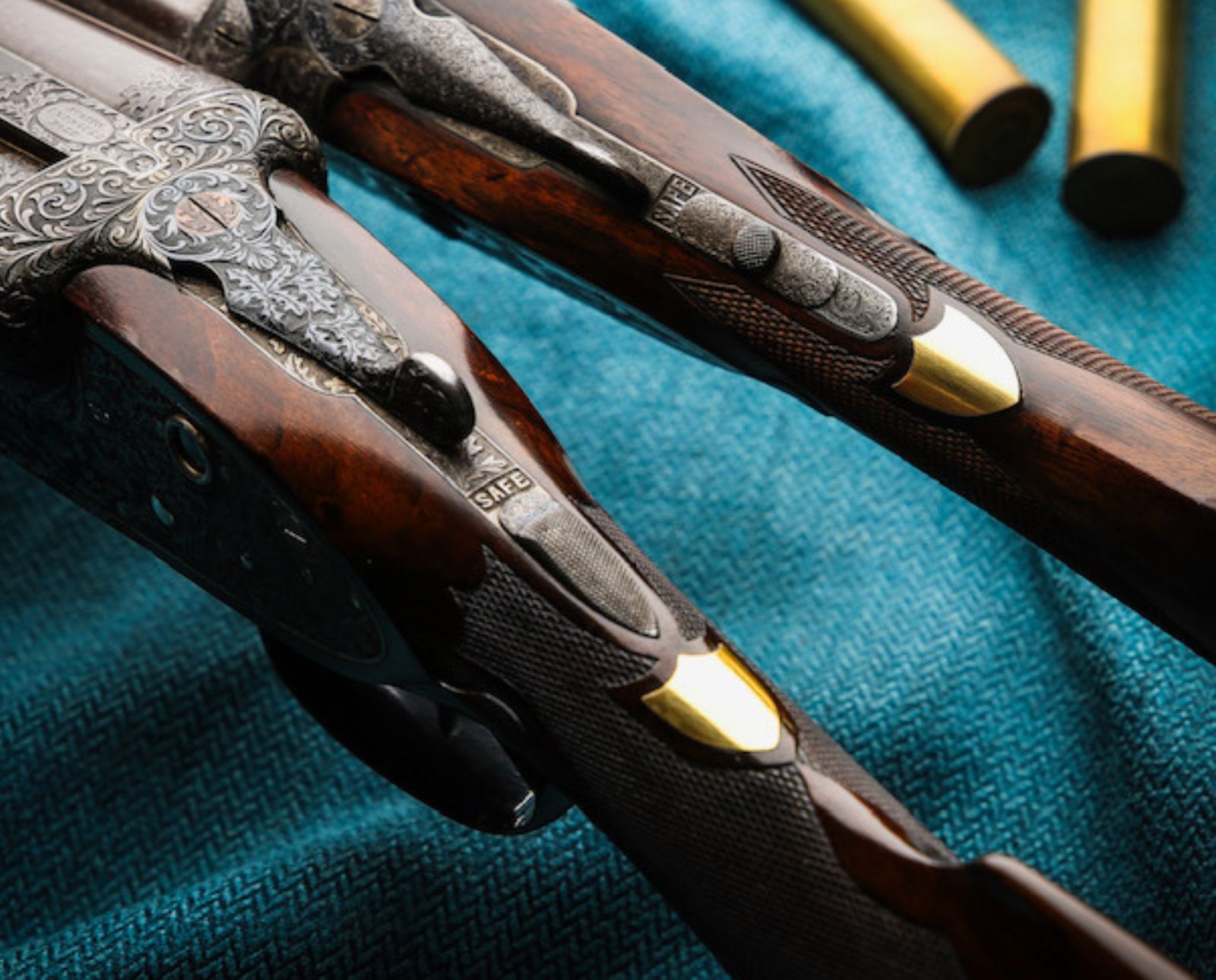 Top of the wrist escutcheons on Scott hammerless guns from 1880’s.